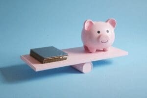 A graphics card balancing with a piggy bank answering is GTX 1650 good for gaming