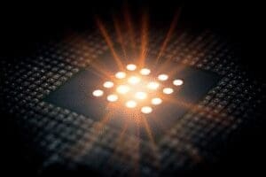 An AMD CPU with 8 glowing cores a review of is Ryzen 7 5700X good for gaming